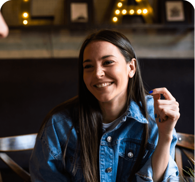A woman smiling